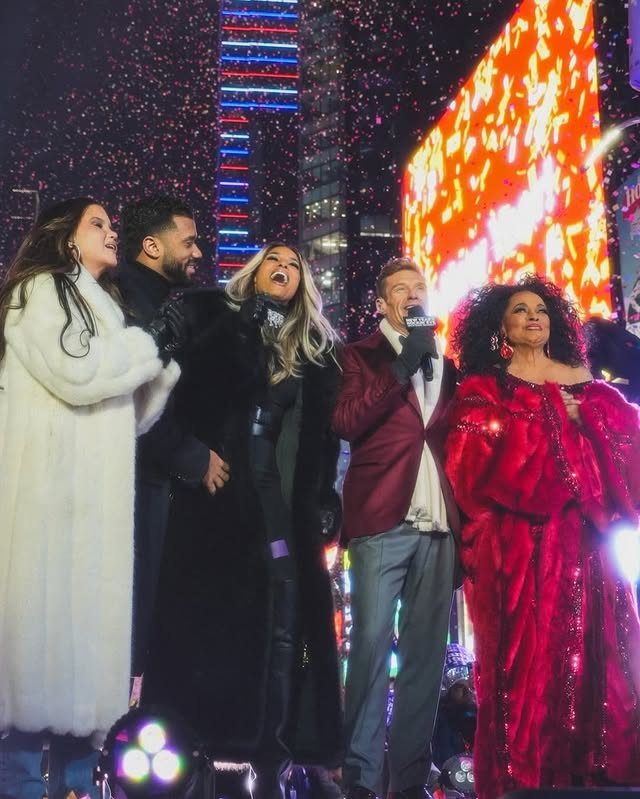 May be an image of microphone, fur, concert and text