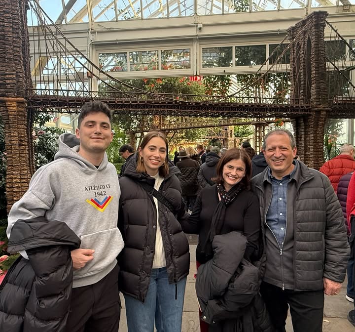 May be an image of standing and text