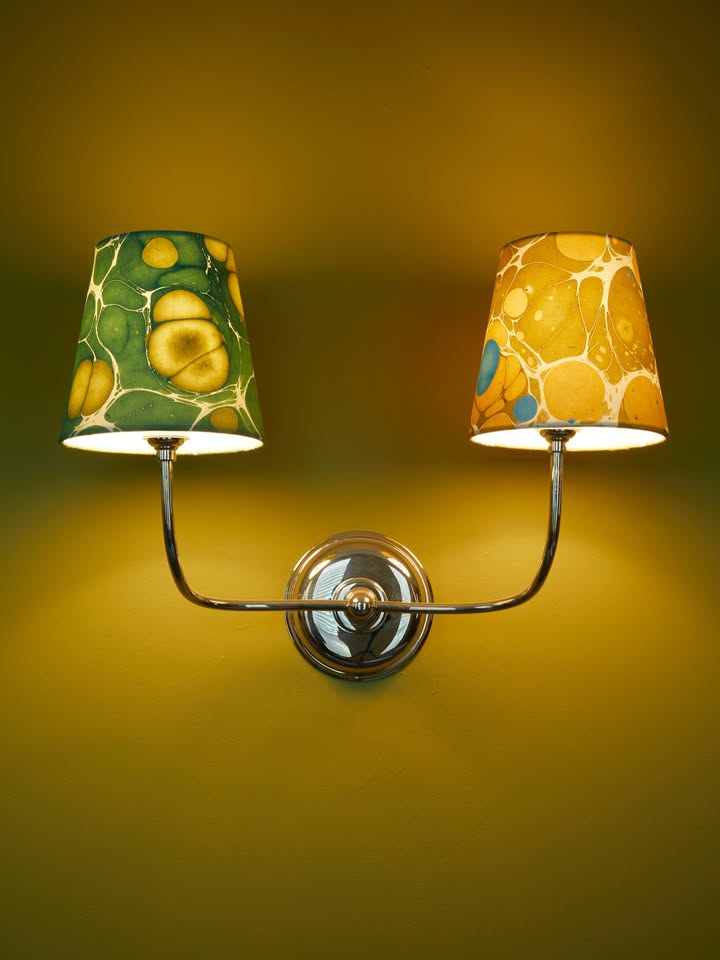 May be an image of lighting, lamp, lightbulb, lamp shade, chandelier and text