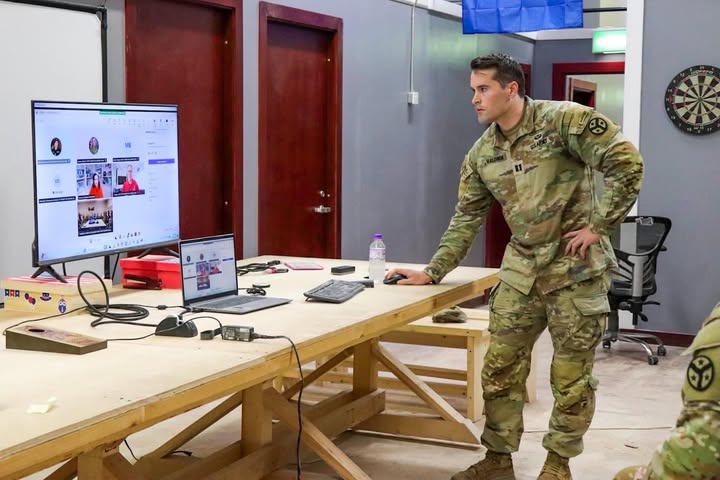 Member of the 3-126th Infantry Battalion operates a computer.