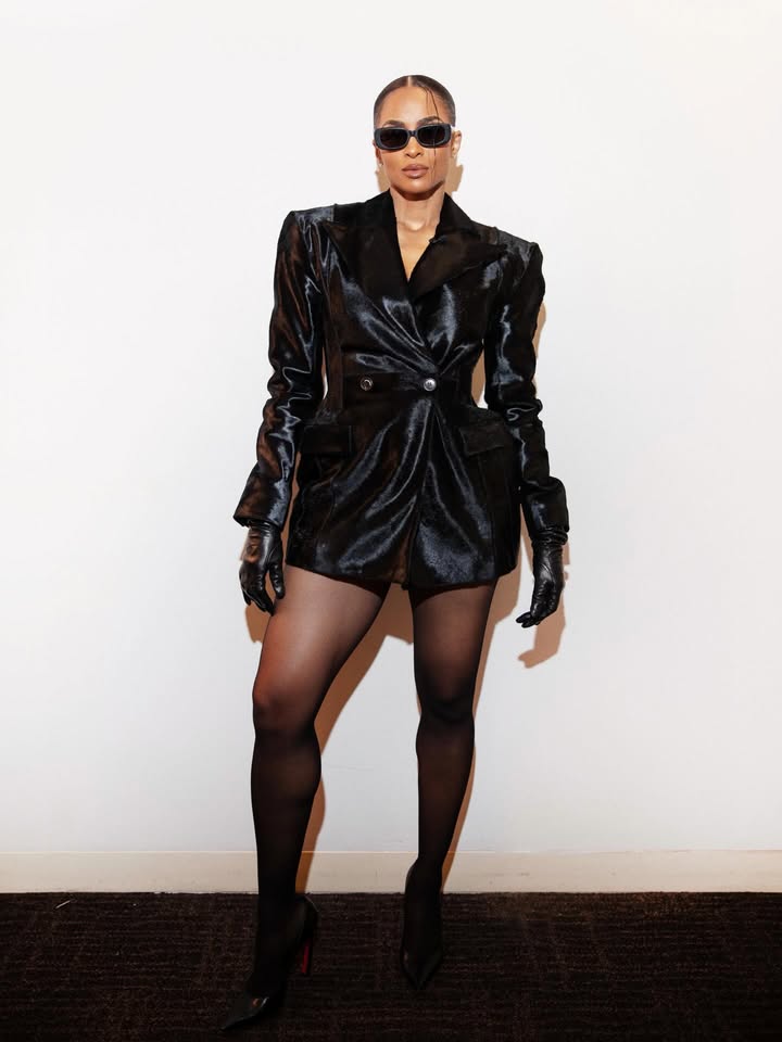 May be an image of leather, eyewear, fishnet stockings and text