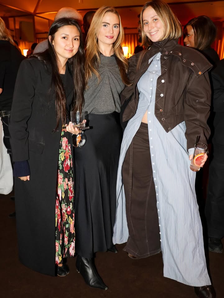 May be an image of kilt, gown and text