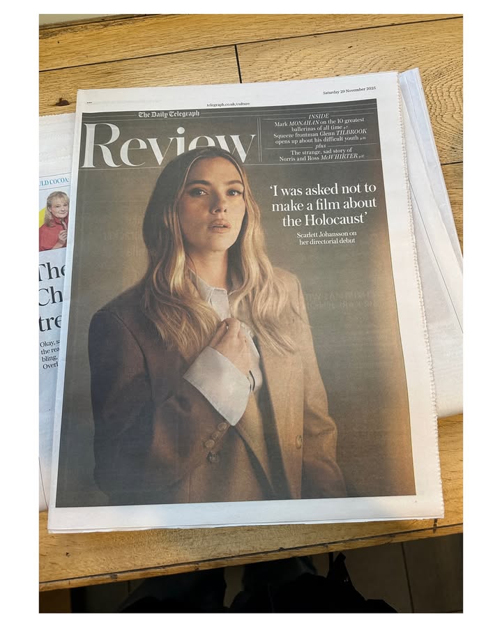 May be an image of magazine, newspaper, poster, newsstand and text