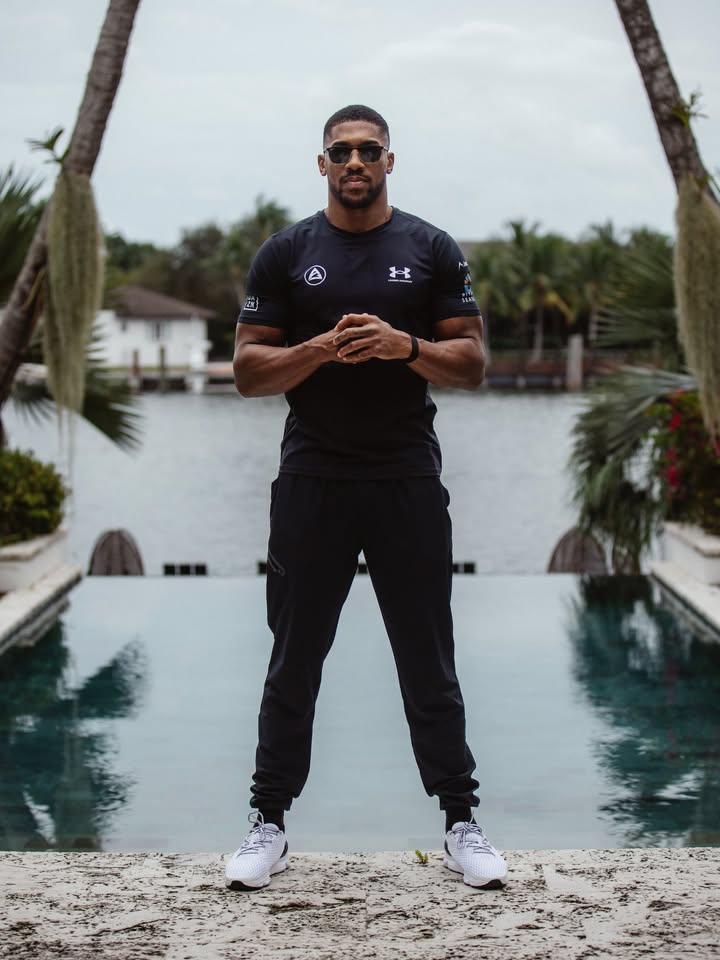 May be an image of one or more people, beard, people playing football, people standing, activewear, wrist watch, sweatpants, sportswear and text