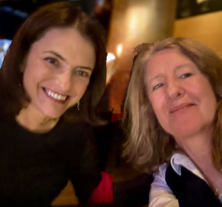 May be a selfie of one or more people and text