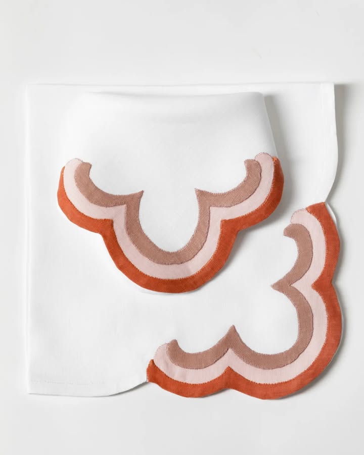 May be an image of tablecloth, napkin, placemat and text