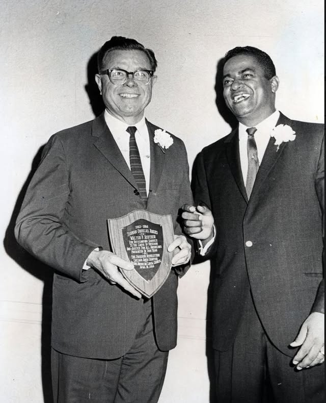 May be an image of standing and text