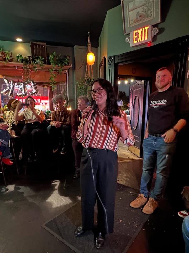 May be an image of standing, accordion and kilt