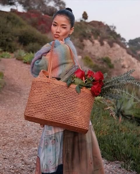 May be an image of one or more people, makeup, basket, picnic and text