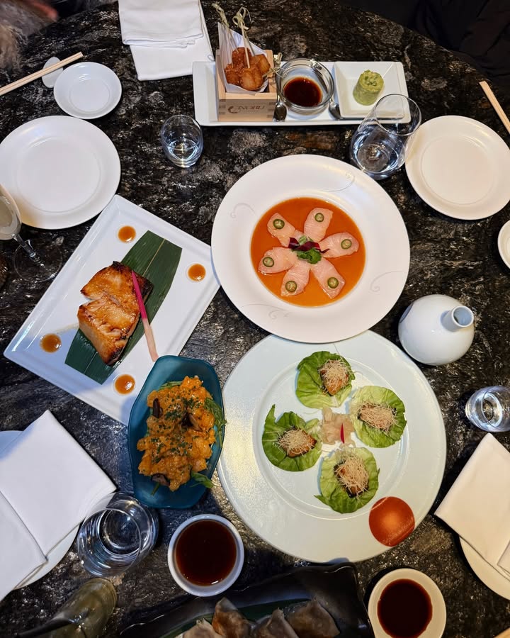 May be an image of sushi, sashimi, dim sum, smoked salmon, buffet and text