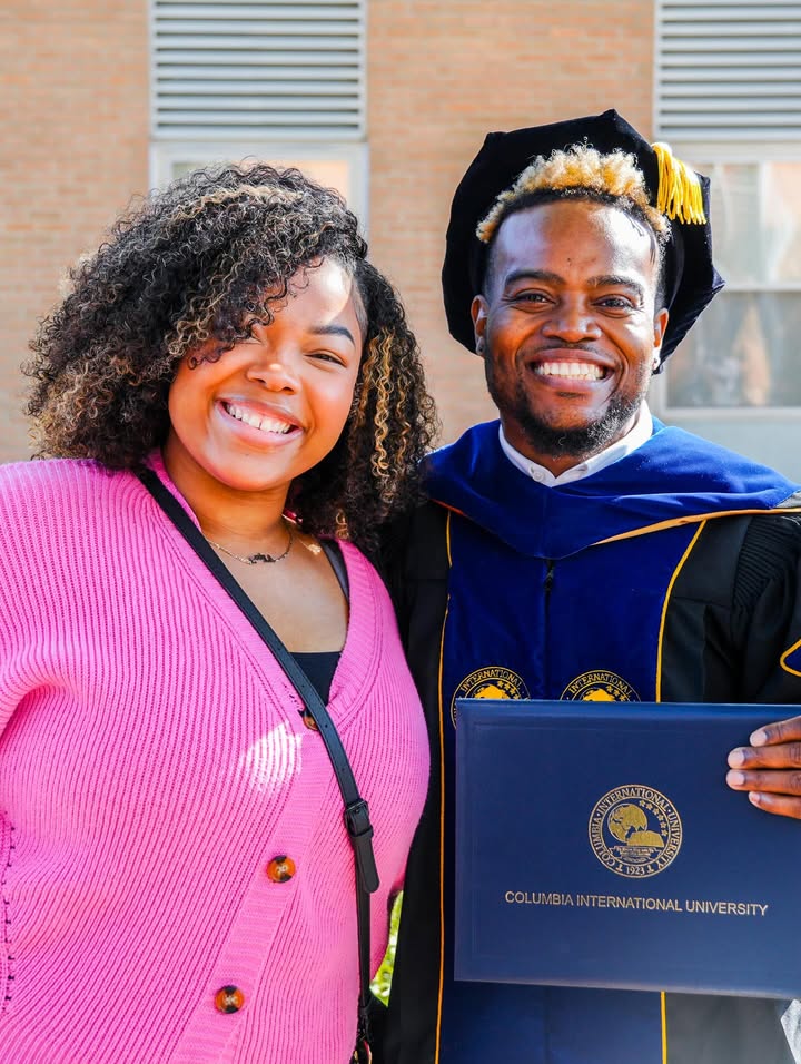 May be an image of smiling and text