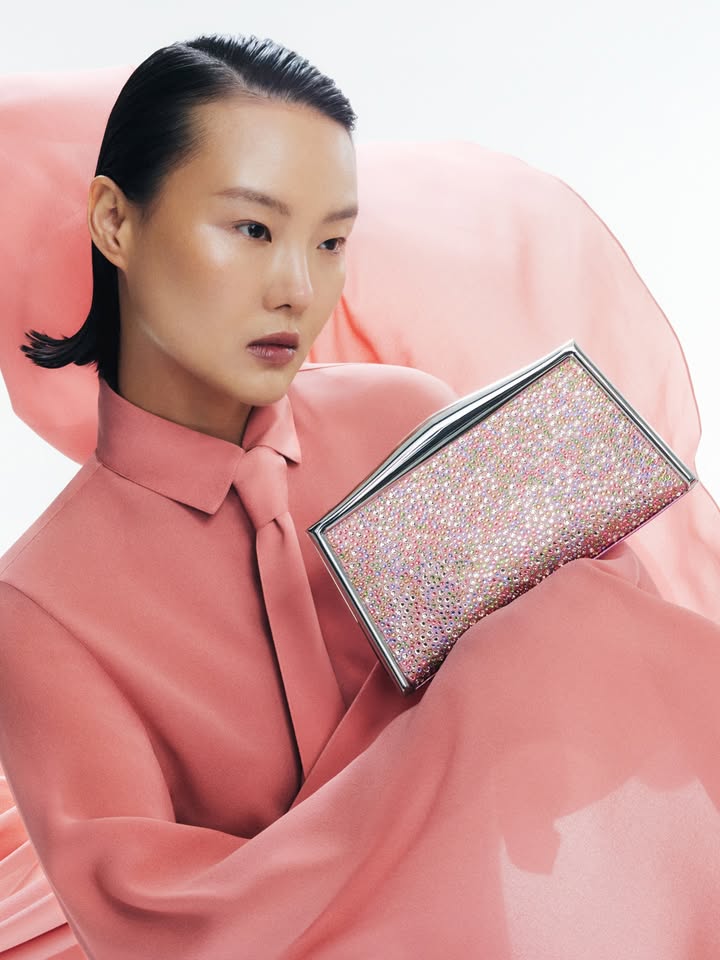 May be an image of one or more people, makeup, pouch, purse, clutch and text