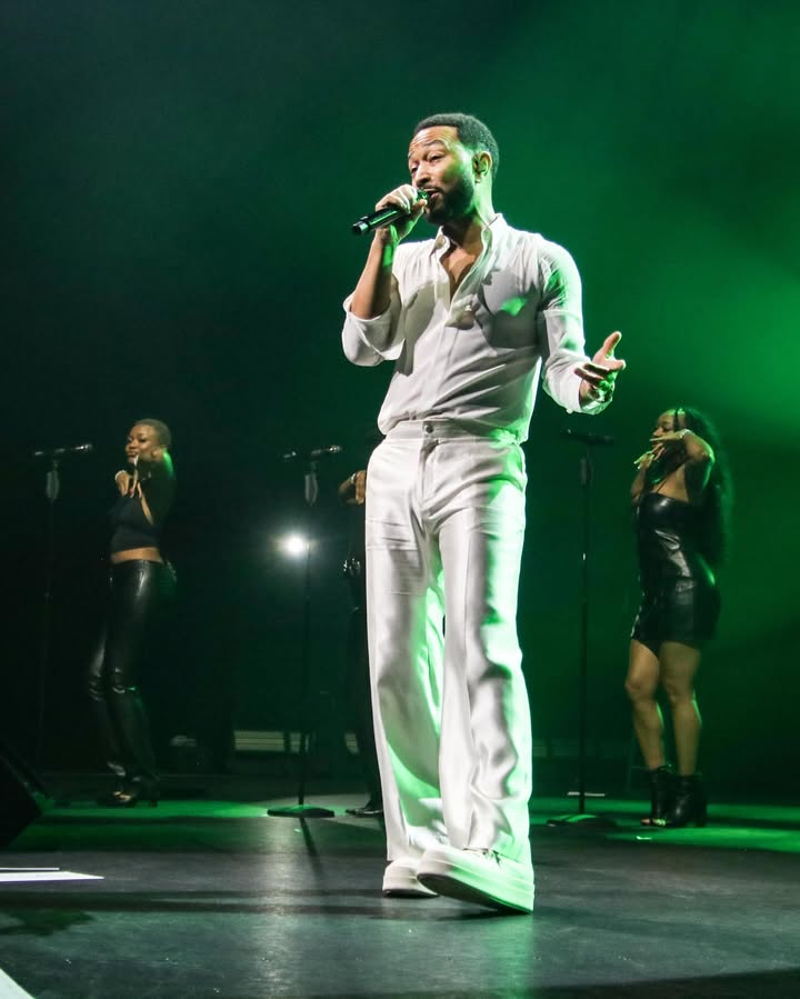 May be an image of microphone, concert and text