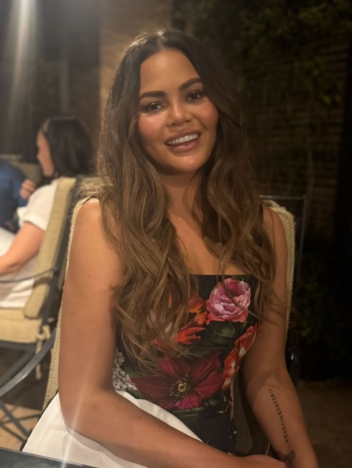 May be an image of one or more people, hair, makeup, people smiling, sundress and text