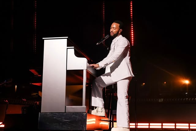 May be an image of piano, microphone, concert and text