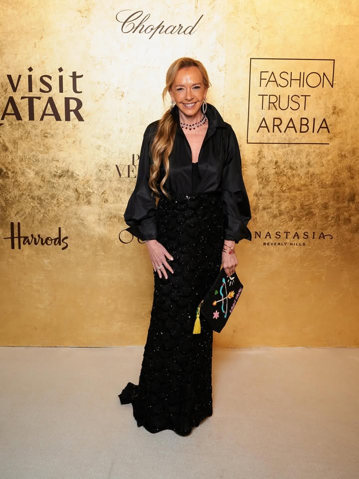 May be an image of gown, dress, carpet and text that says 'Chopard visit ATAR FASHION TRUST ARABIA Harrods NASTASIA BEVERLY BEVERLYHILLS HILLS'