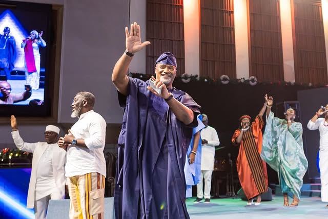 May be an image of one or more people and text