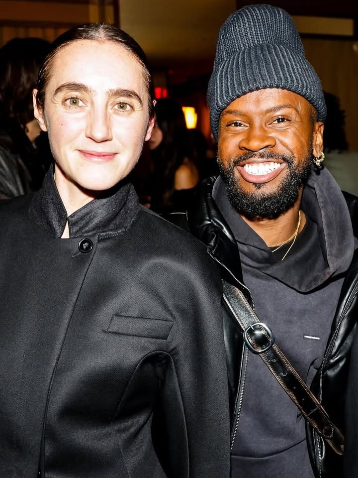 May be an image of one or more people, beard, people standing, turtleneck and text