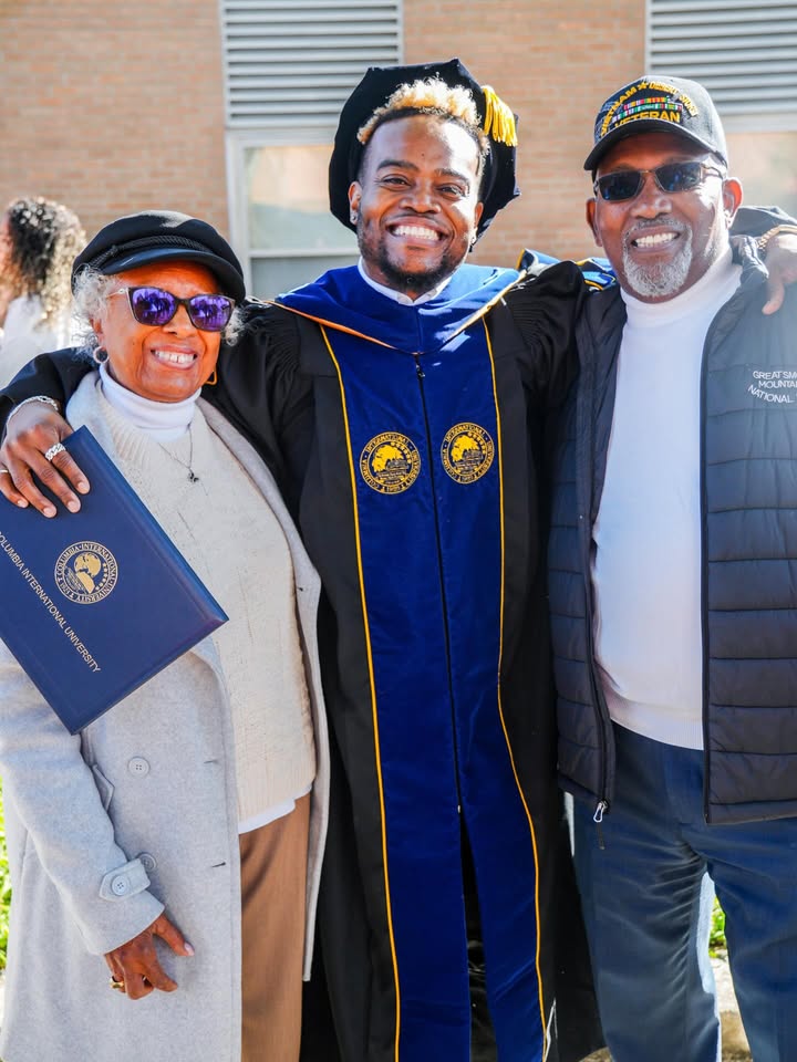 May be an image of one or more people, people standing and text