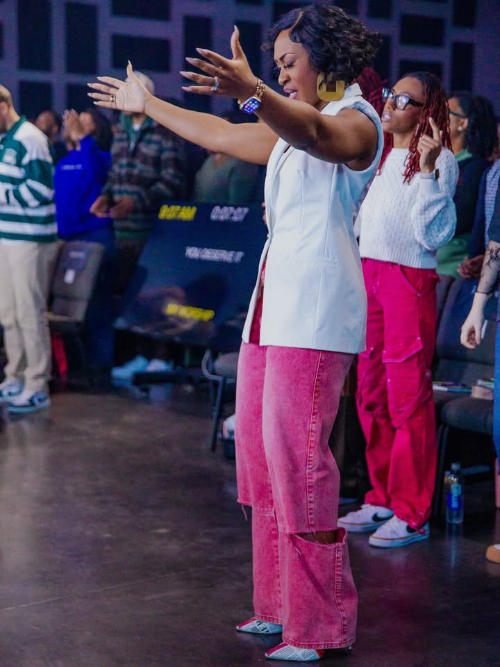 May be an image of one or more people, people dancing, people standing, tambourine and text