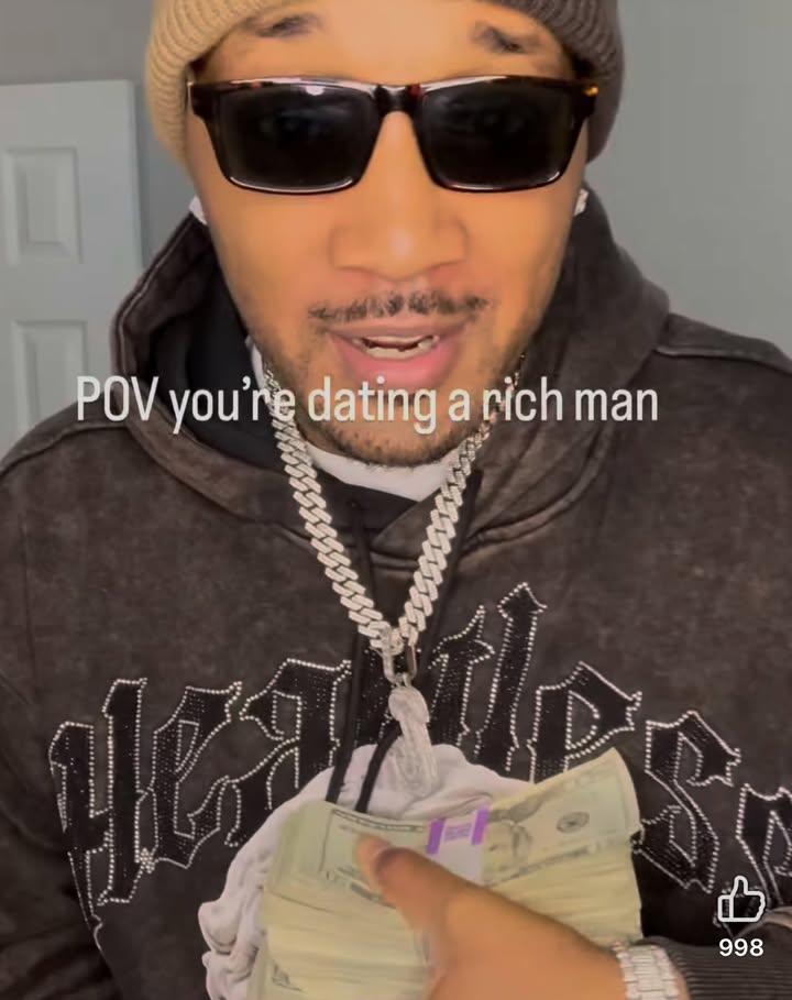 May be a meme of one or more people, money, sunglasses and text that says 'POV you're dating a rich man 998'