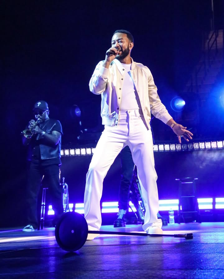 May be an image of microphone, concert and text