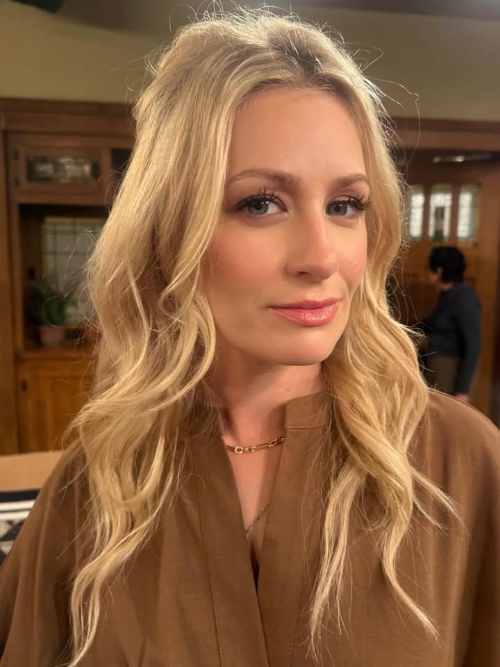 May be an image of one or more people, blonde hair, eyeliner, makeup and text