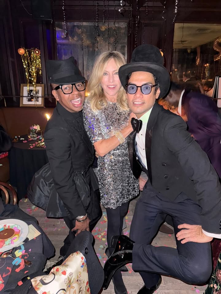 May be an image of dinner jacket, bowler hat and text