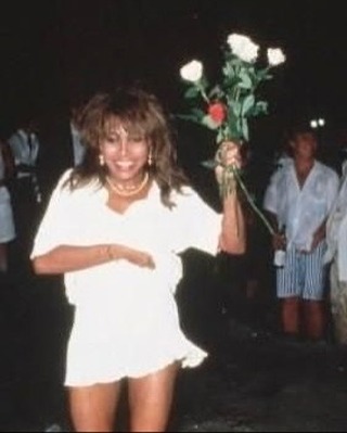 May be an image of one or more people, bangs, miniskirt and text