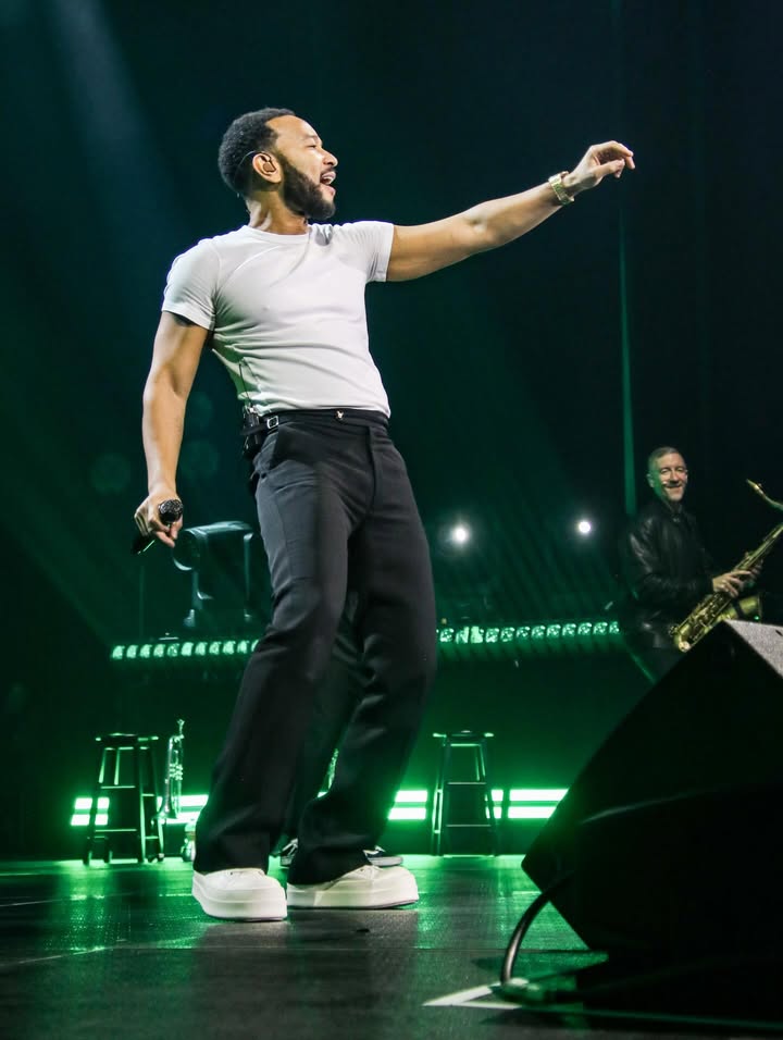 May be an image of microphone, concert and text