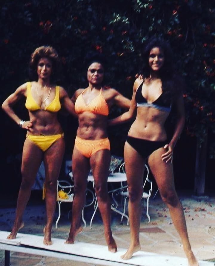 May be an image of one or more people, people standing, underwear and text