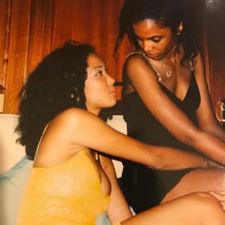 May be an image of one or more people, miniskirt, portable cassette player and text