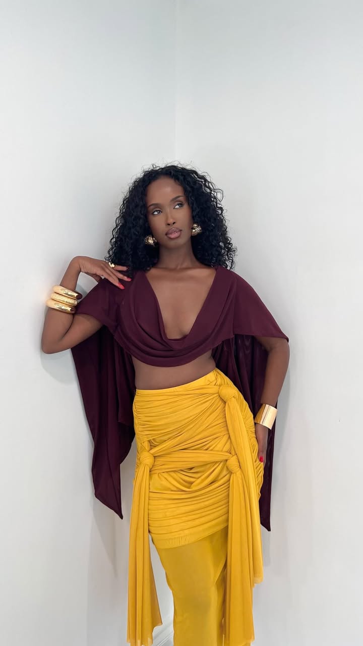 May be an image of sarong, crochet, skirt, poncho and text