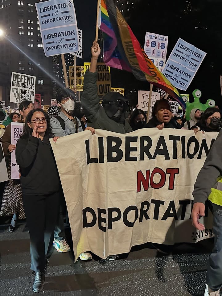 May be an image of standing and banner