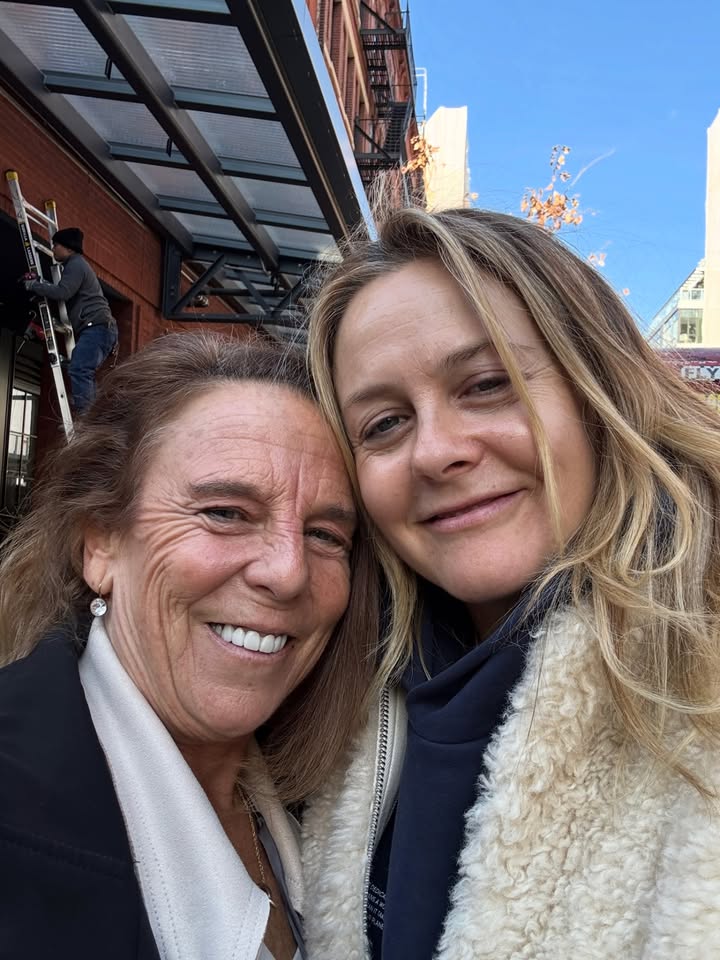 May be an image of one or more people and text