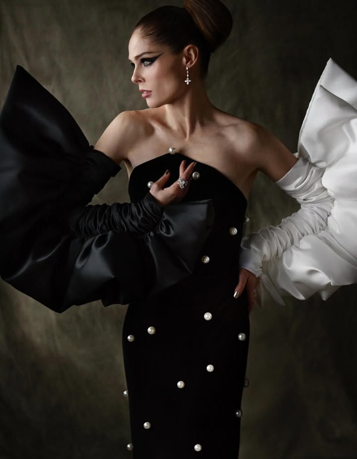 May be an image of one or more people, makeup, dress, gown and text