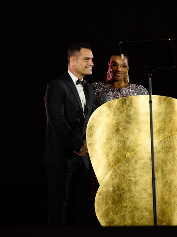 May be an image of tambourine, dinner jacket and text