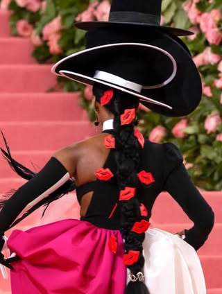 May be an image of gown, bowler hat and text