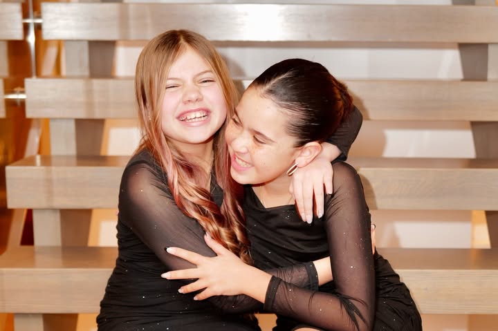 May be an image of child, smiling and text