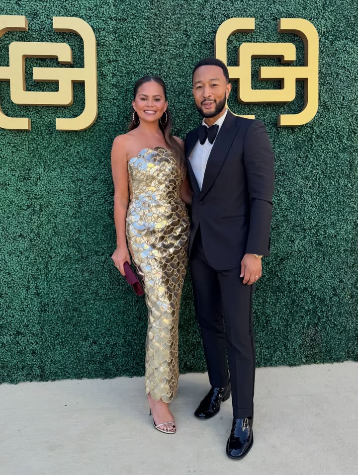 May be an image of dinner jacket, gown, carpet and text