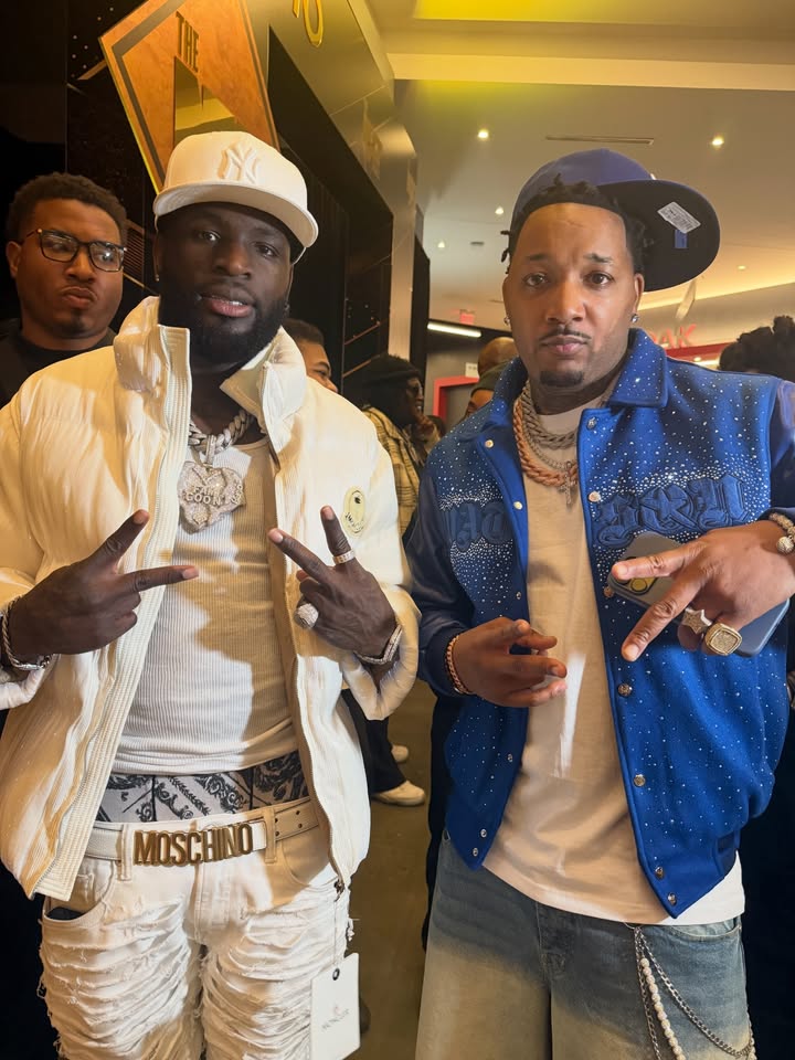 May be an image of one or more people, people standing and text that says 'N S MOSCHINO'