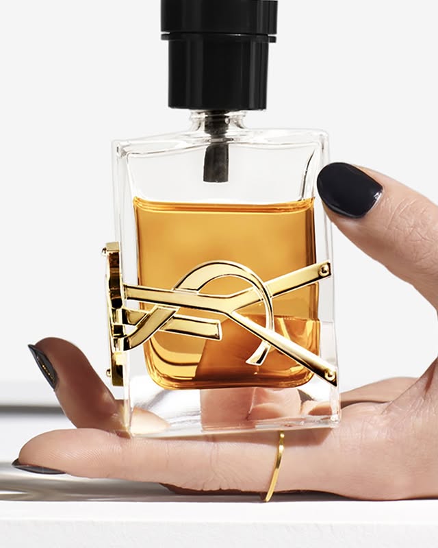 May be an image of fragrance, perfume, bottle and text