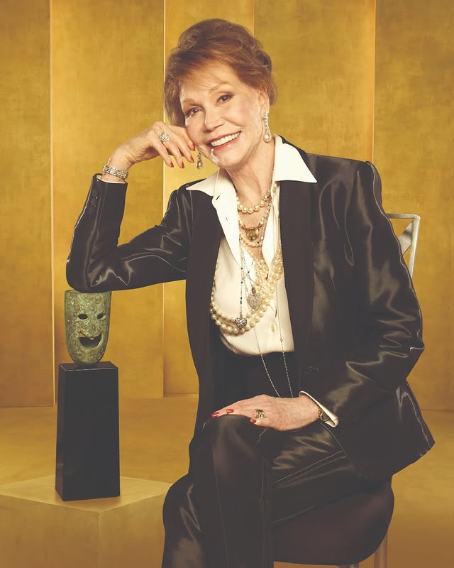 May be an image of one or more people and text