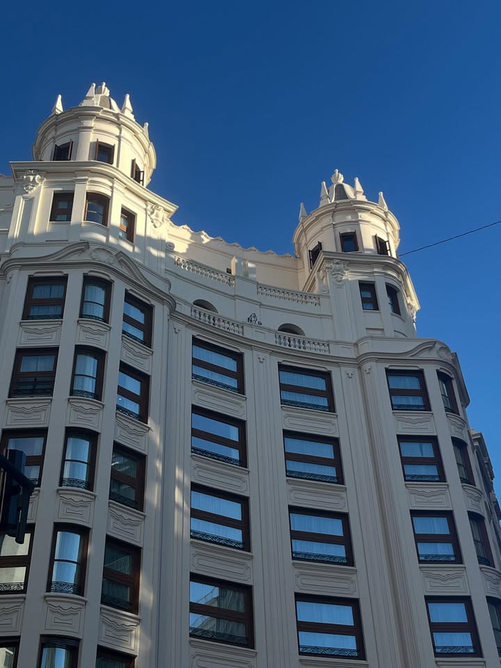 May be an image of skyscraper, tower and buildings