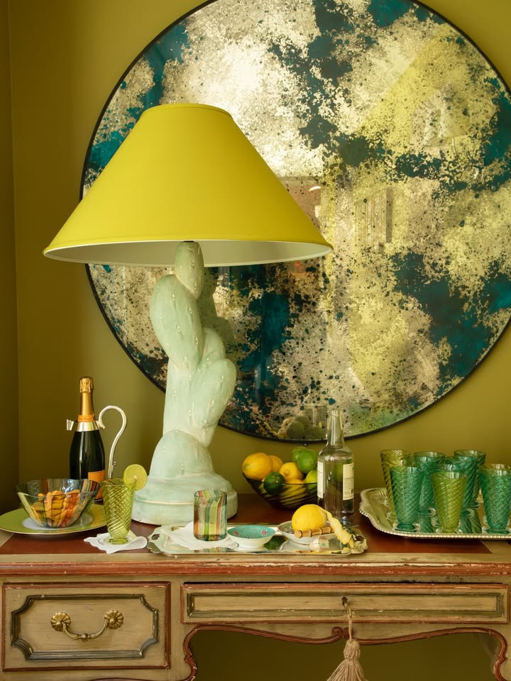 May be an image of candle holder, lamp, lamp shade, bust and text