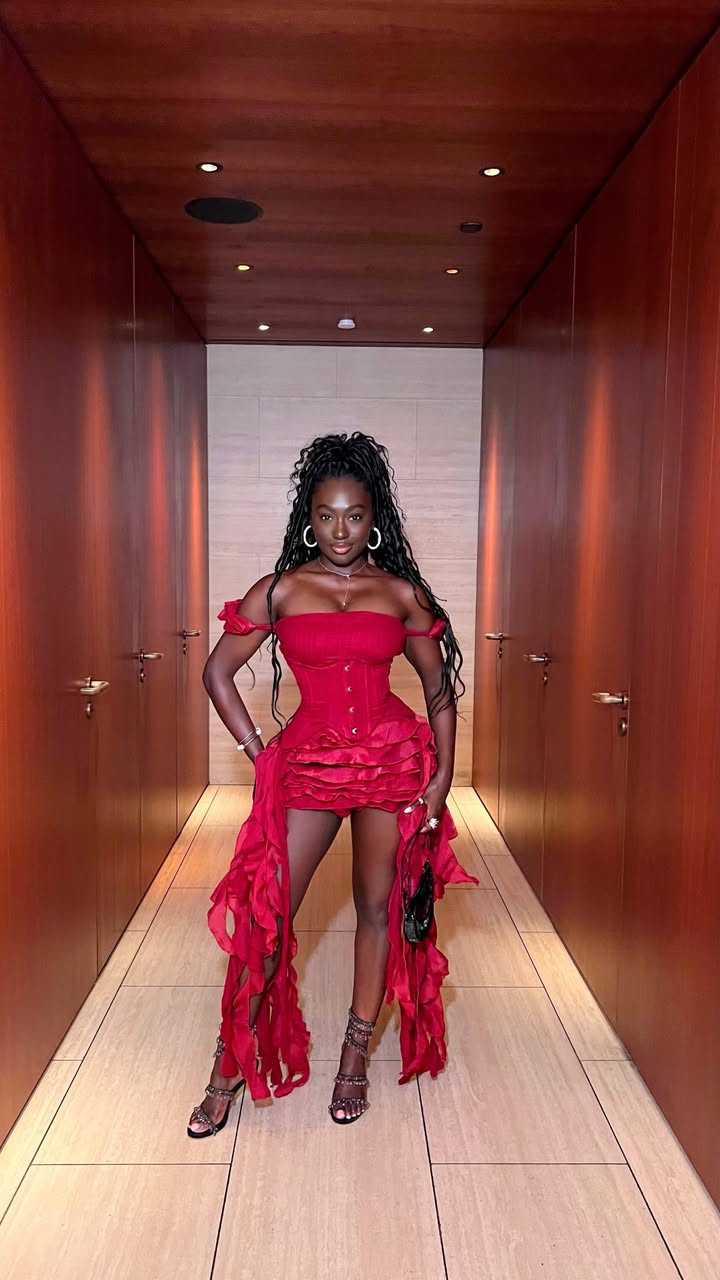 May be an image of fishnet stockings, gown, dress and text