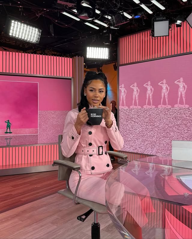 May be an image of one or more people, makeup, television, newsroom, office and text