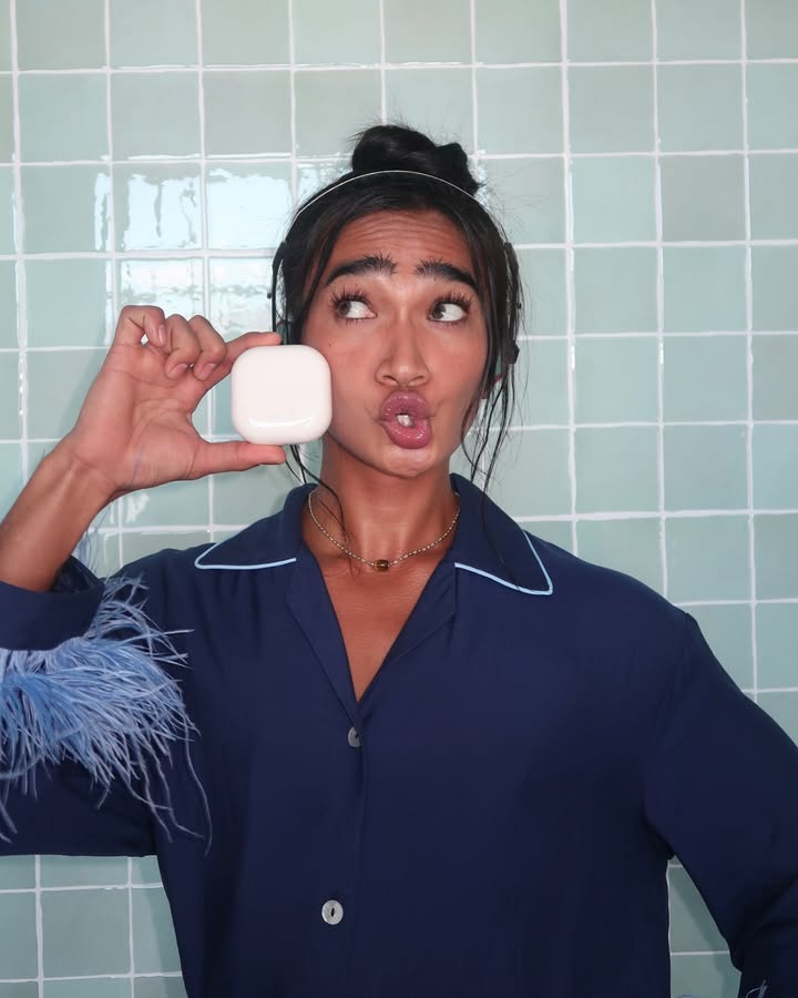 May be an image of one or more people, makeup, phone, bath robe, soap, bar soap, dental floss and text