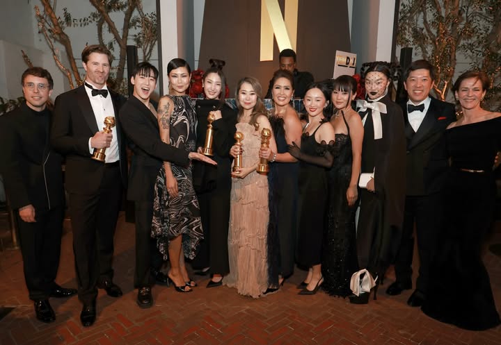 May be an image of carpet, gown, dinner jacket and text