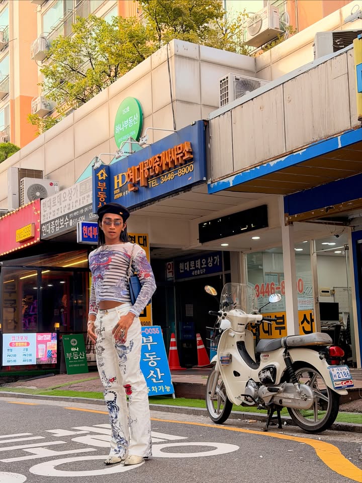 May be an image of scooter and outdoors